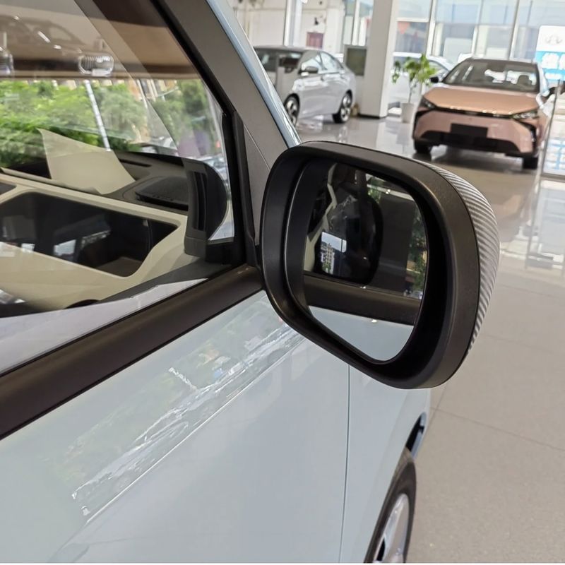 Geely Panda Mini Solar EV 4 Seater Small Vehicle with Manual Driver's Seat Adjustment